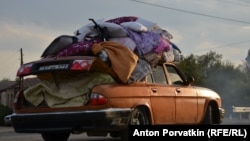 2023-ի սեպտեմբերի 19-20-ը Լեռնային Ղարաբաղում Ադրբեջանի իրականացրած ռազմական ագրեսիայի հետևանքով Արցախը հայաթափվեց, 105 հազար արցախահայեր ապաստանեցին Հայաստանում: Նկարում արցախցի ընտանիքը Ստեփանակերտից տեղափոխվում է Հայաստան, Կոռնիձոր, 29-ը սեպտեմբերի, 2023թ․