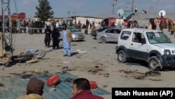 PHOTO GALLERY: Deadly Bombings Target Campaign Offices On Eve Of Pakistan Elections (CLICK TO VIEW)