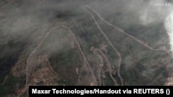 A satellite image shows a long traffic jam of vehicles along the Lachin corridor as ethnic Armenians flee from Nagorno-Karabakh, September 26, 2023. (Maxar Technologies/Handout via REUTERS.)