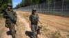 Литвански граничари долж границата со Белорусија, август 2023 година.. 