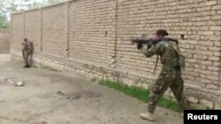 Ооган армиясынын аскери талибдер менен салгылашуу учурунда. Кундуз. 31-август, 2019-жыл