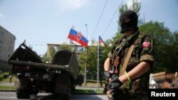 "It's a scary situation being under the control of unknown armed men waving automatic weapons around. You can't ask them what right they have to check your passport or even who they are or who they claim to represent."
