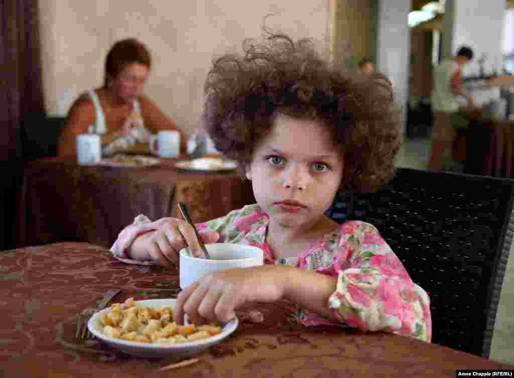 A girl from Moscow inside one of Abkhazia's Soviet-era hotels. 