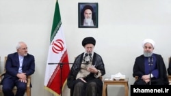 حسن روحانی رئیس جمهور آیتالله خامنهای رهبر و محمدجواد ظریف وزیر خارجه ایران