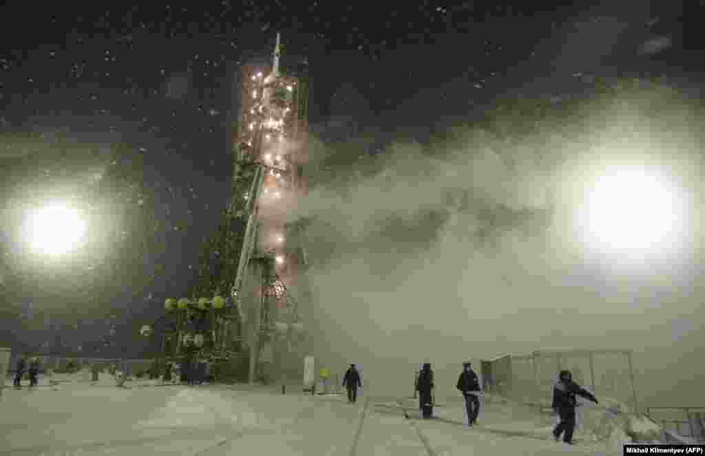 A Soyuz rocket that would take U.S. astronaut Dan Burbank to the International Space Station (ISS) readies for launch on a freezing morning in November 2011. Since the U.S. Space Shuttle program ended in 2011, the United States has paid Russia tens of millions of dollars per astronaut for rides to the ISS. 
