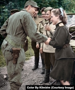 An American soldier (left) greets a Soviet officer in Seoul in 1945. Five years later the United States and the U.S.S.R. were on opposite sides in the Korean War.
