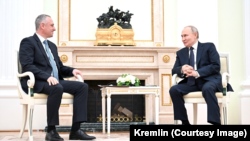 Бадра Гунба и Владимир Путин, 5 марта