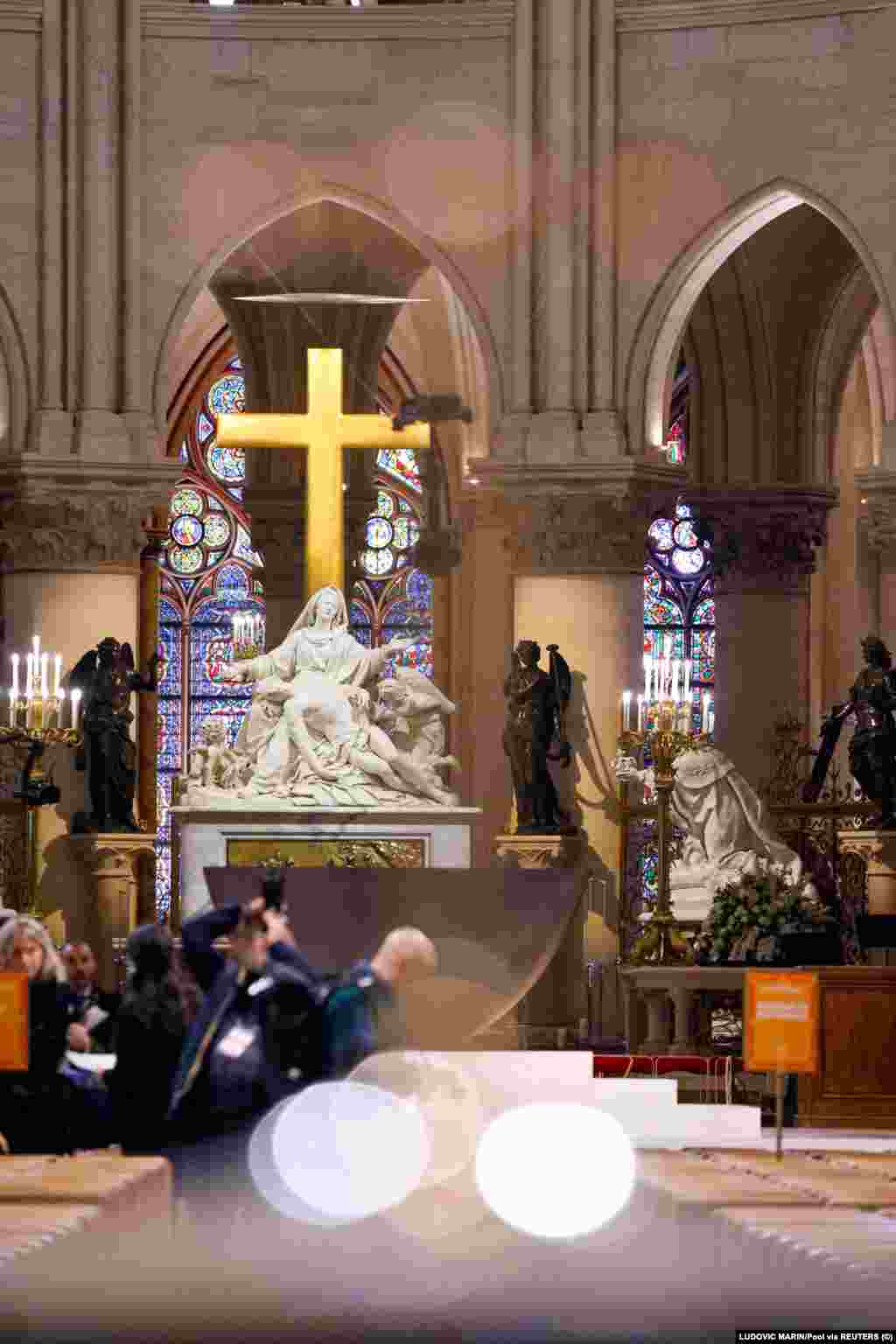 A view of the 'Statue de la Vierge de Pitie' (Pieta) at Notre-Dame de Paris cathedral, ahead of its official reopening ceremony after more than five years of reconstruction work following the April 2019 fire, in Paris on December 7, 2024. LUDOVIC MARIN/Pool via REUTERS