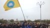 Флаг Калмыкии на митинге в Элисте против назначения мэром Дмитрия Трапезникова, архивное фото