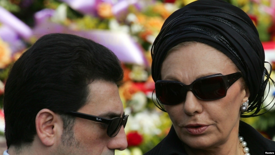 Alireza Pahlavi with his mother at the funeral for the prince of Monaco in Monte Carlo in 2005 