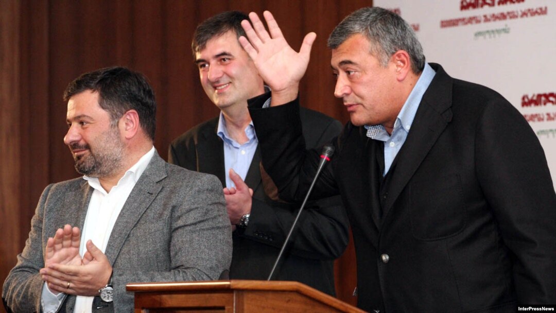 Georgian Party leaders Erosi Kitsmarishvili, Sozar Subari, and Levan Gachechiladze (left to right) announced the new bloc in Tbilisi on October 12.