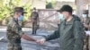 Armenian Prime Minister Nikol Pashinian fist-bumps a serviceman during a visit to one of the military units, 10 August, 2020.