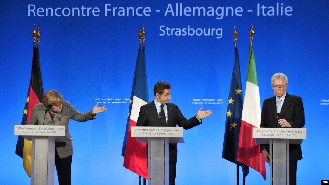 German Chancellor Angela Merkel (left), French President Nicolas Sarkozy (center) and Italian Prime minister Mario Monti attend a press conference during a European mini-summit on the debt crisis in Strasbourg, France.