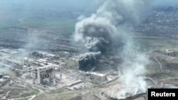 Последствия российских обстрелов в Мариуполе