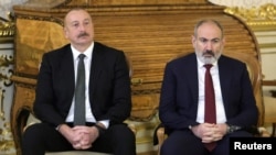 Russia - Azeri President Ilham Aliyev and Armenian Prime Minister Nikol Pashinyan are seen during a visit to the Catherine Palace at the Tsarskoye Selo State Museum and Reserve in Saint Petersburg, December 26, 2023.