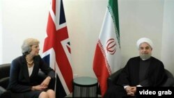  حسن روحانی و ترزا می (عکس از آرشیو)