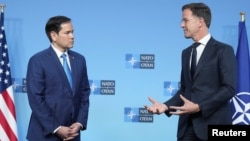 NATO Secretary General Mark Rutte meets with US Secretary of State Marco Rubio on the sidelines of a NATO foreign ministers meeting in Brussels on April 3.