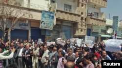 نیویورک تایمز می‌گوید شورشیان سوریه، کردها را به همکاری با بشار اسد متهم می‌کنند- تظاهرات ضد حکومتی کردهای سوریه در شهر قامشلی، ۲۰۱۱