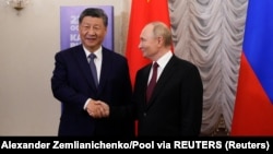 Владимир Путин менен Си Цзиньпиндин 2024-жылдын октябрь айындагы жолугушуусу. 