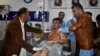 A man injured in a bomb explosion is treated at a hospital in Quetta, Balochistan on January 7.