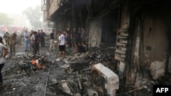  محل انفجار در منطقه الکراده بغداد