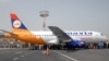 Armenia - Passengers board an Armavia airline flight at Yerevan's Zvartnots airport.