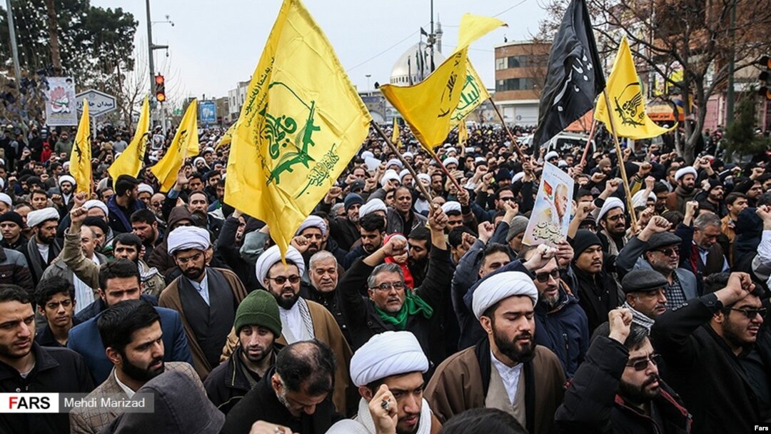 Members of the Fatemiyoun Brigade attend the funeral in Tehran for Major General Qasem Soleimani, Iran's top military commander.