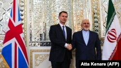 محمدجواد ظریف، وزیر خارجه ایران، و همتای بریتانیاییاش جرمی هانت