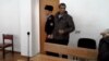 На суде по делу Сарфараза Хуссаина, обвиняемого в организации канала незаконной миграции. Алматы, 23 января 2015 года.