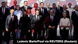 European leaders pose for a family photo at a summit for the Coalition of the Willing in Paris on March 27.