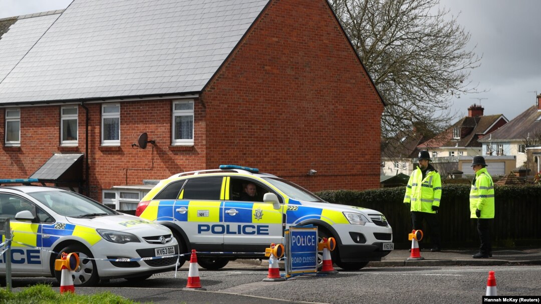 British police guard the home of former Russian intelligence officer Sergei Skripal in Salisbury.