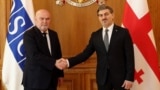 GEORGIA -- Feridun Sinirlioğlu, the OSCE Secretary General with Mikheil Kavelashvili