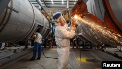 Workers on a production line in Nantong, China, on April 7